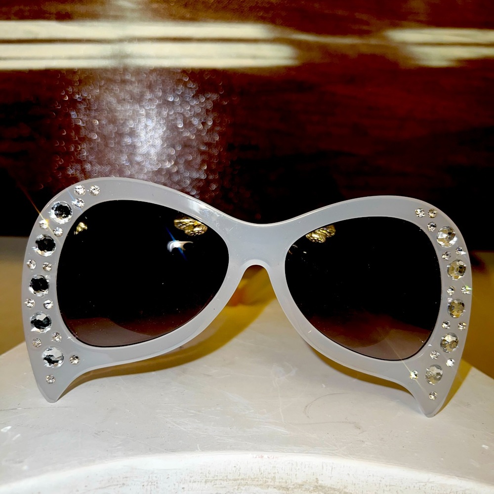 Oversized Bat Sunglasses Oversized bat frame with engraved trim